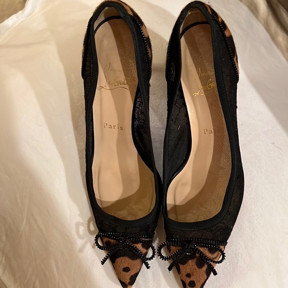 Louboutin lace with animal print with zipper bows. Beautiful shoes. Runs narrow. - Picture 1 of 10